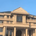 辽源黄金麻别墅外墙干挂石材效果示例