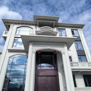 辽源白麻别墅外墙干挂石材效果示例