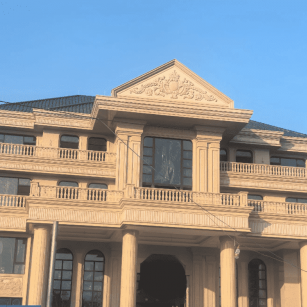 辽源黄金麻别墅外墙干挂石材效果示例