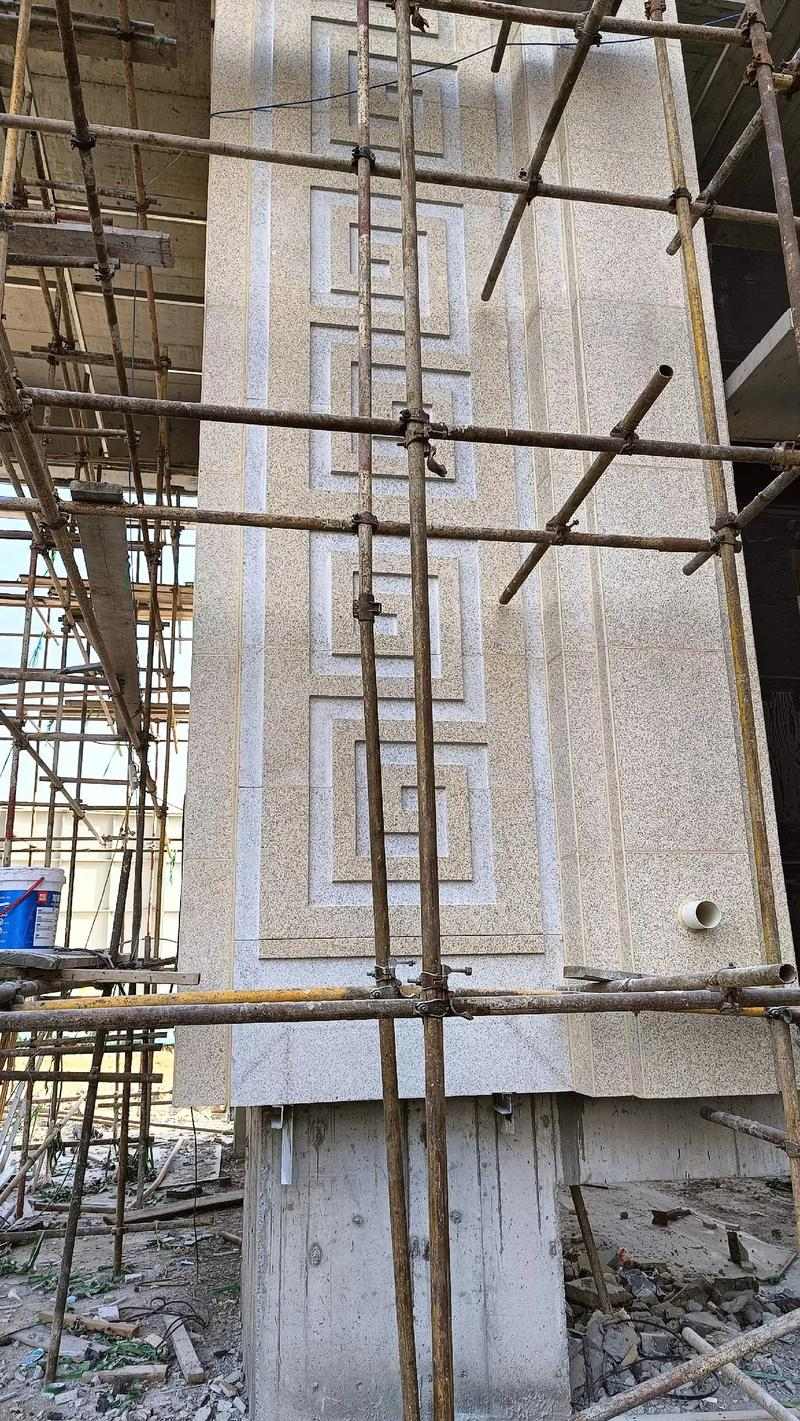 辽源 黄金麻花岗岩别墅外墙干挂回纹造型效果