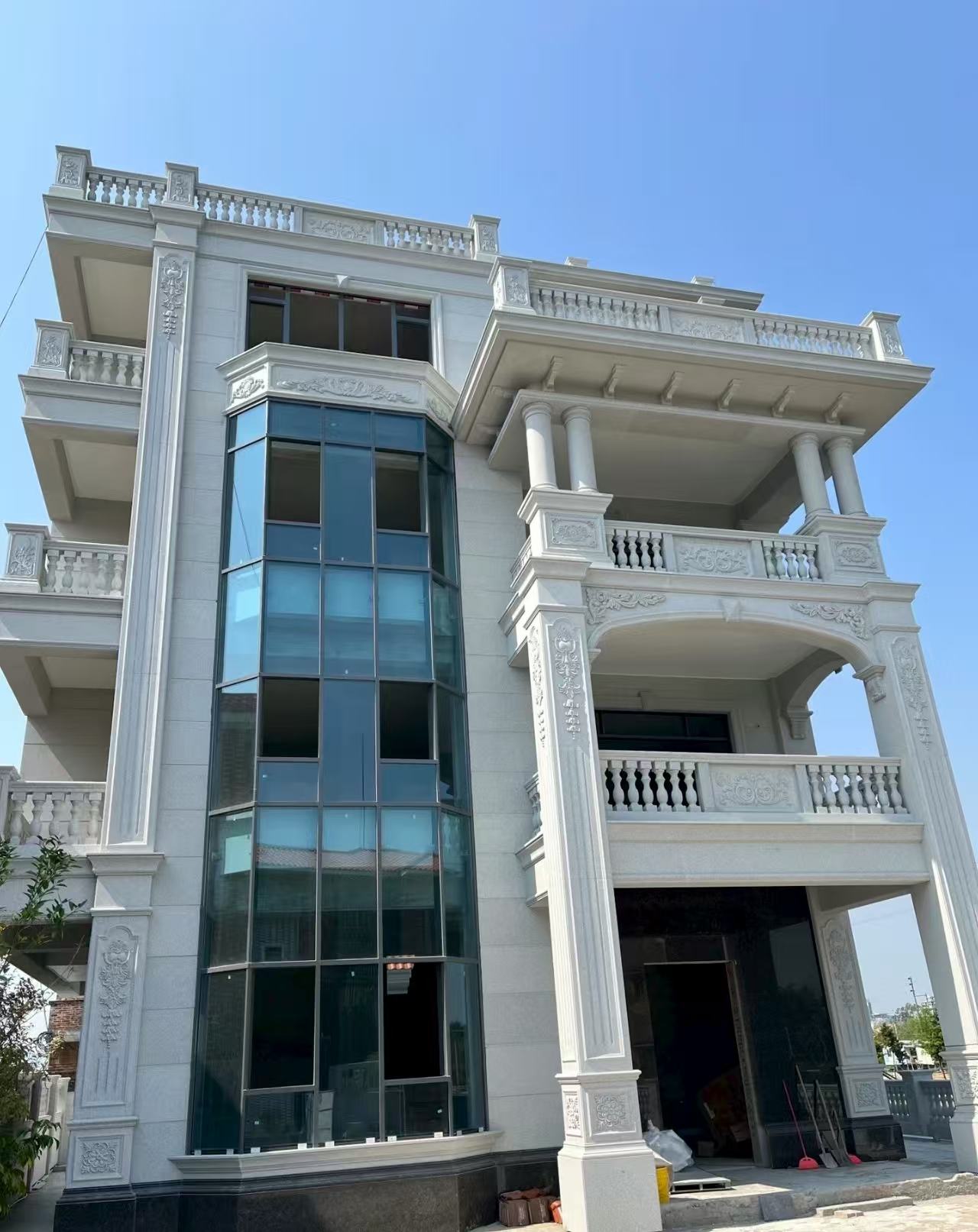 辽源 白麻花岗岩别墅外墙干挂效果展示